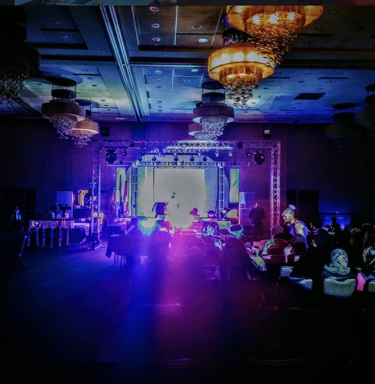 Ballroom stage with truss, screen and uplighting