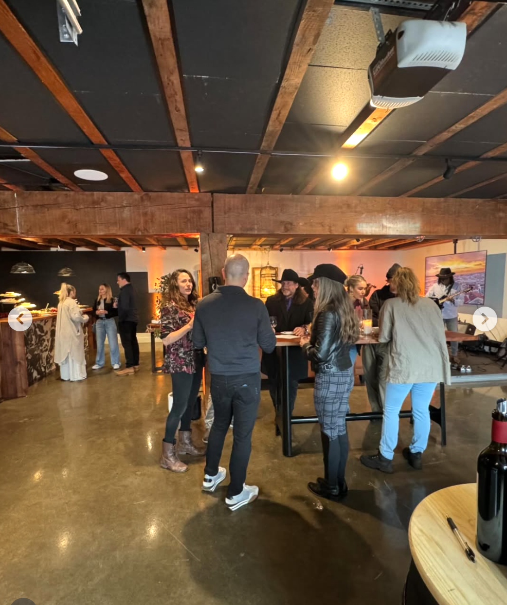 Event reception with warm lighting and guests